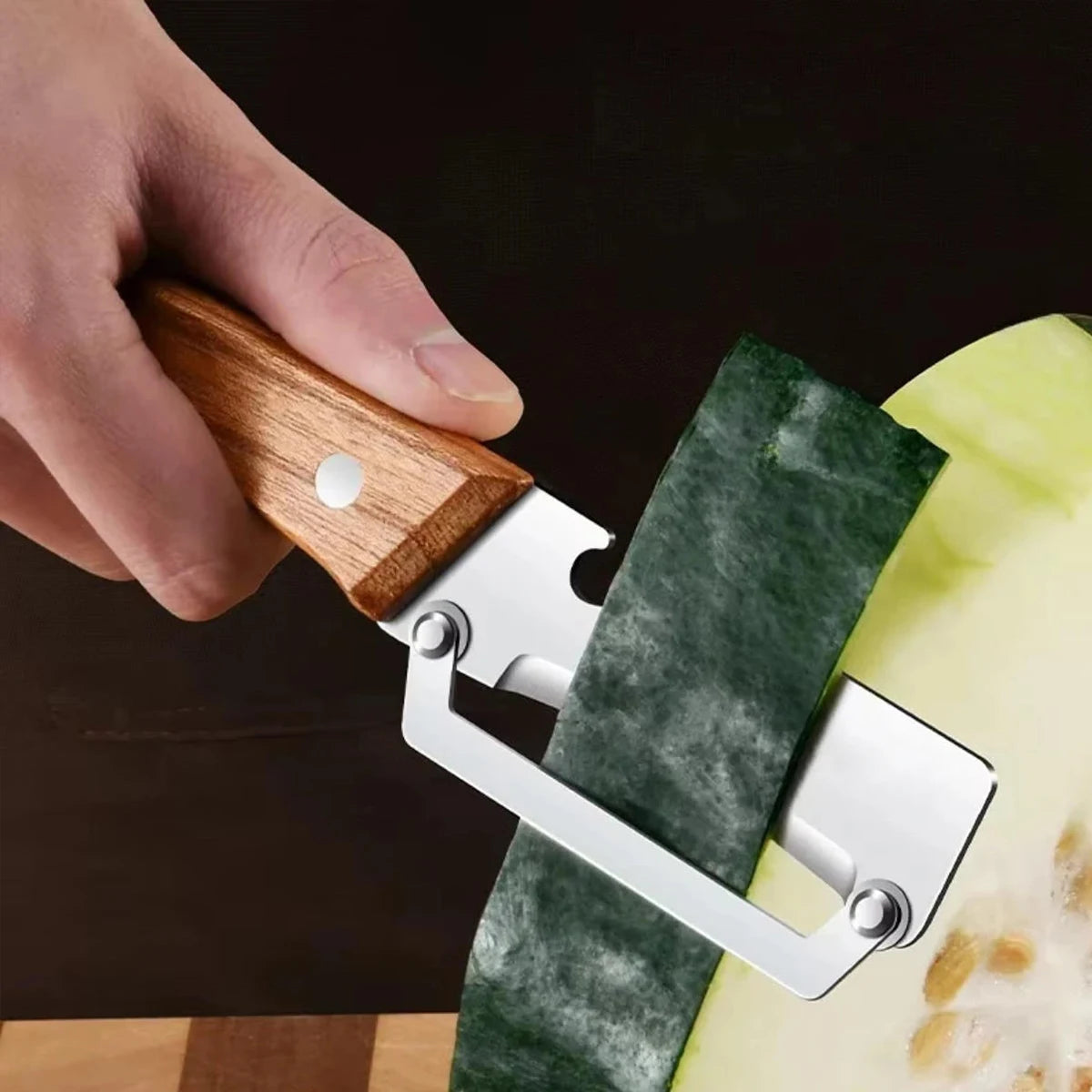 Stainless steel peeler with wooden handle for peeling and slicing fruits and vegetables | Durable and smooth operation